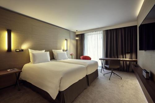 Radisson Blu CDG Airport Terminal Hotel, Paris - Tap to explore photos
