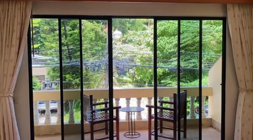 Kata View Guesthouse - Tap to explore photos