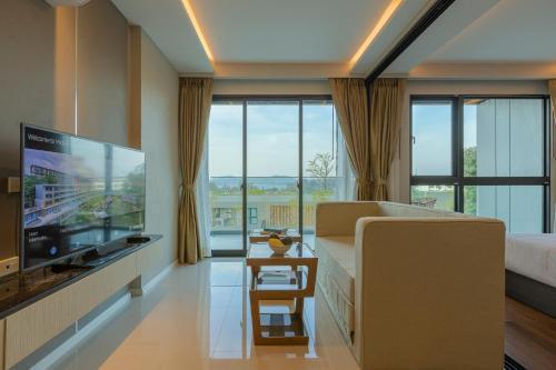 Sea View Panora Surin by Holy Cow, 1-BR - Tap to explore photos