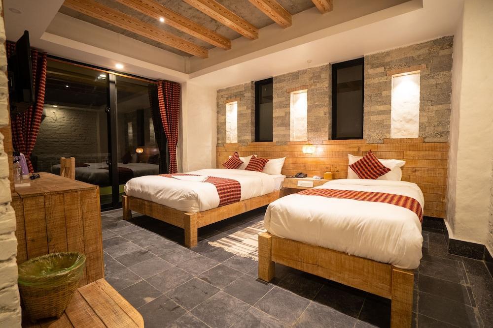 HOTEL MERA PEAK PVT LTD Room Type - Deluxe Triple Room