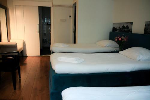 Hotel 55 - City Centre Room Type - Comfort Triple Room with Shower