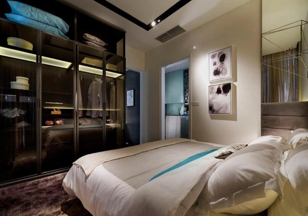 Expressionz Suites by iHost Global - Tap to explore photos