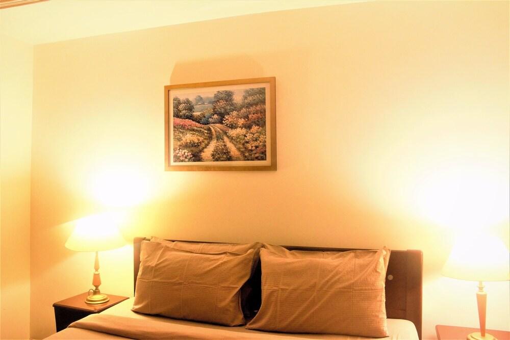Garden Service Suites at Times Square - Tap to explore photos