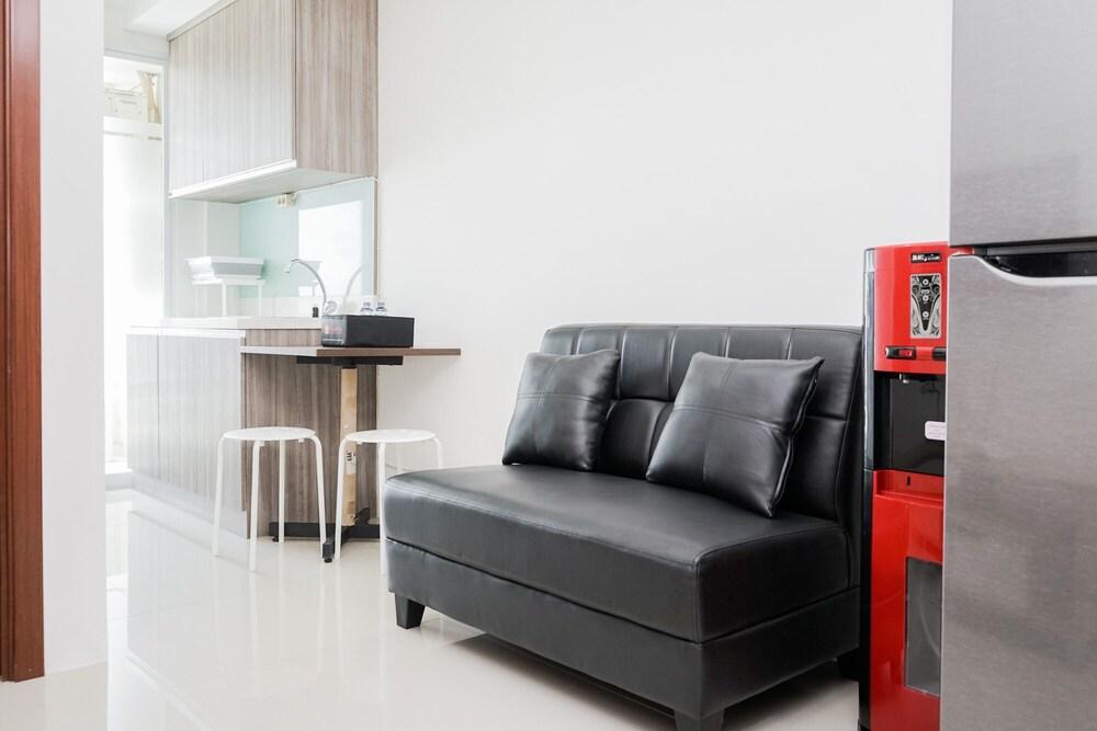 Comfortable 1BR Apartment at Vittoria Residence - Tap to explore photos