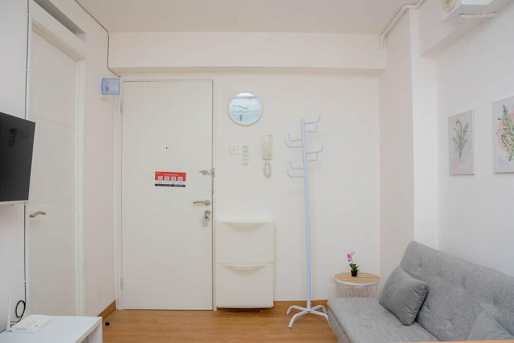 Gorgeous and Cozy 2BR at Bassura City Apartment - Tap to explore photos