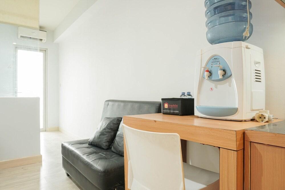 Cozy and Simply Studio Titanium Square Apartment - Tap to explore photos