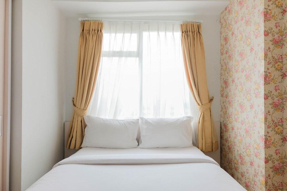 Tranquil 2BR Apartment at Bintaro Park View - Tap to explore photos