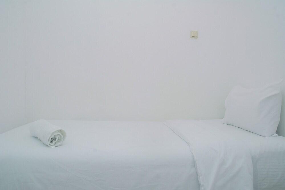 Comfy and Furnished 2BR Bassura City Apartment near Mall - Tap to explore photos