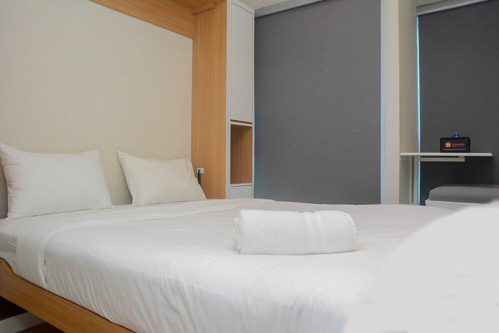 Best Studio Room with Wall Bed Tifolia Apartment