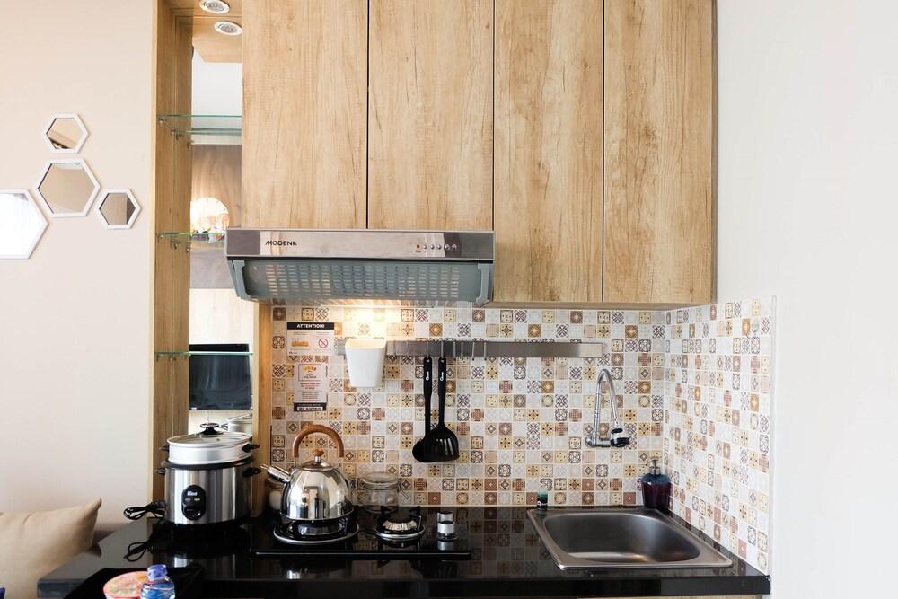 Modern and Bright 2BR Green Pramuka Apartment - Tap to explore photos
