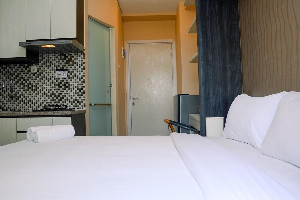 Comfy Studio Green Pramuka Apartment with City View - Tap to explore photos