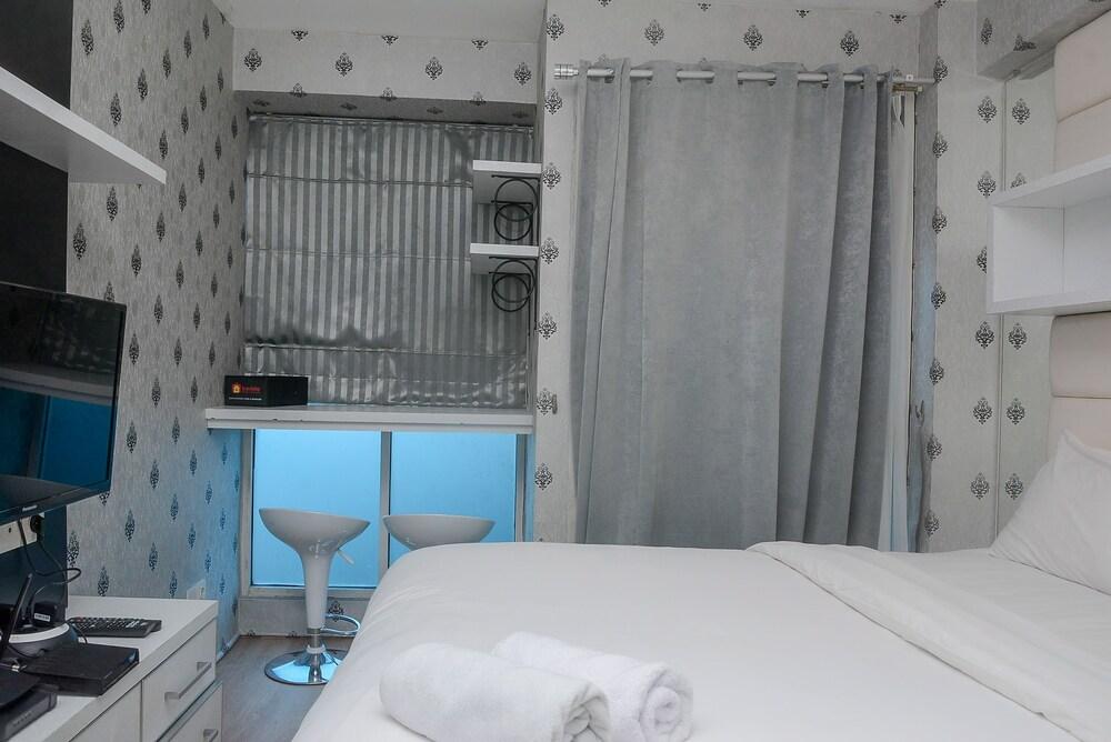 Comfort with City View Studio Tifolia Apartment - Tap to explore photos
