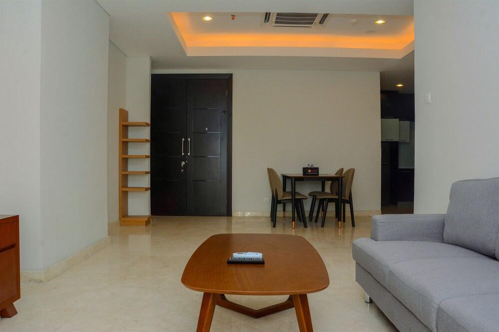 Comfy and Spacious 2BR The Masterpiece Epicentrum Apartment By Travelio - Tap to explore photos