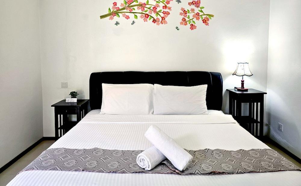 Triima Inn Tanjung Rhu by Perfect Host - Tap to explore photos