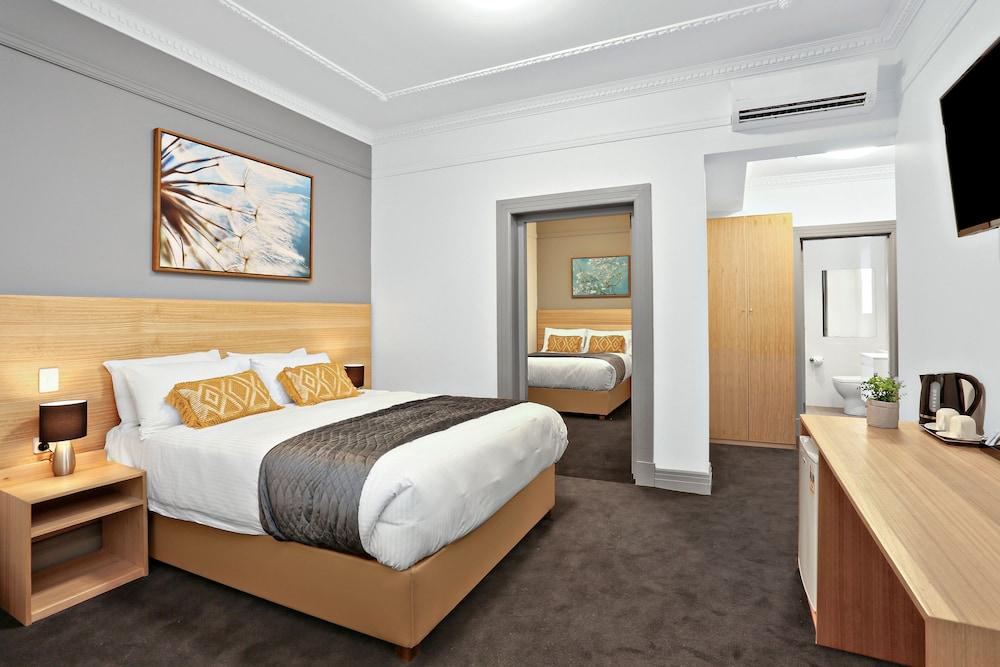Meridian Hotel Room Type - Deluxe Quadruple Room, 2 Queen Beds, Non Smoking Meridian Hotel Room Type - Deluxe Quadruple Room, 2 Queen Beds, Non Smoking