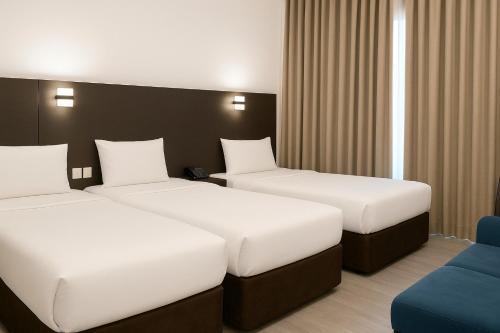Garden City Hotel Room Type - Luxury Triple Room Garden City Hotel Room Type - Luxury Triple Room