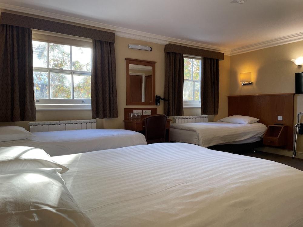 Orchard Hotel Room Type - Standard Quadruple Room Orchard Hotel Room Type - Standard Quadruple Room