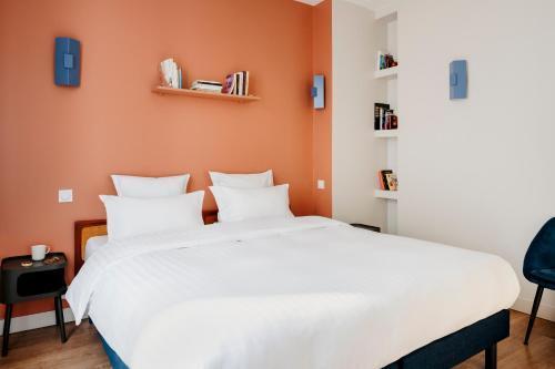 Edgar Suites Grands Boulevards - Boulanger - Tap to explore photos