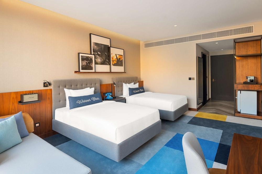 The WB Abu Dhabi, Curio Collection by Hilton - Free Theme Park Tickets Room Type - Two Double Beds Artist Room with Pool View With Theme Park Access The WB Abu Dhabi, Curio Collection by Hilton - Free Theme Park Tickets Room Type - Two Double Beds Artist Room with Pool View With Theme Park Access