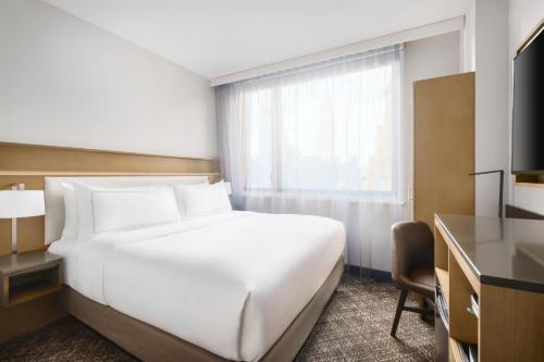 DoubleTree by Hilton New York Times Square South - Tap to explore photos
