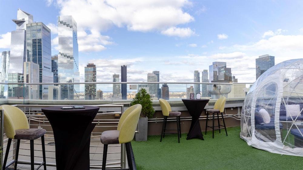 DoubleTree by Hilton New York Times Square South - Tap to explore photos