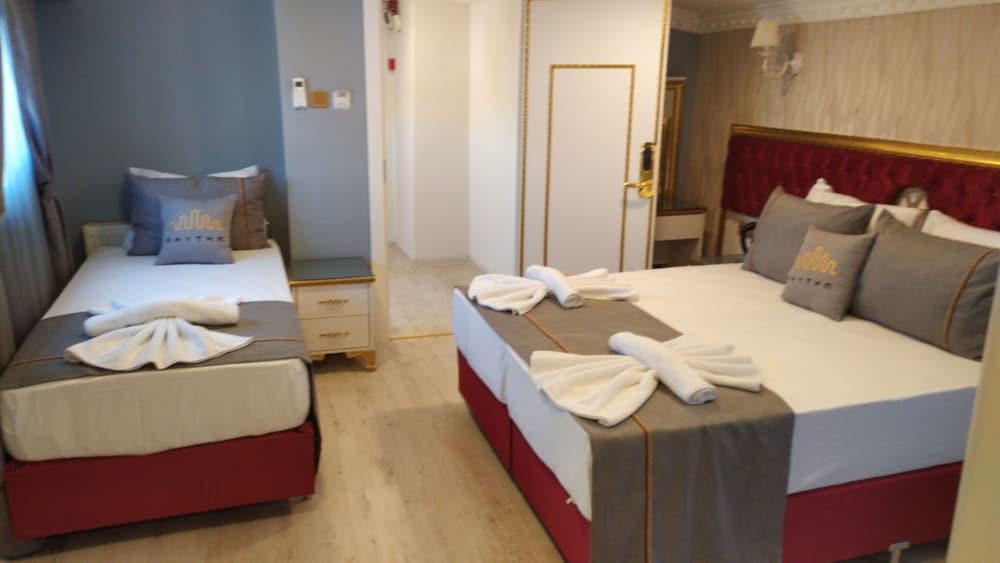 Rhythm Hotel Room Type - Economy Triple Room