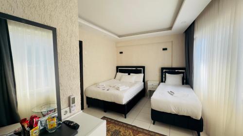 Mitra Downtown Hotel - Tap to explore photos
