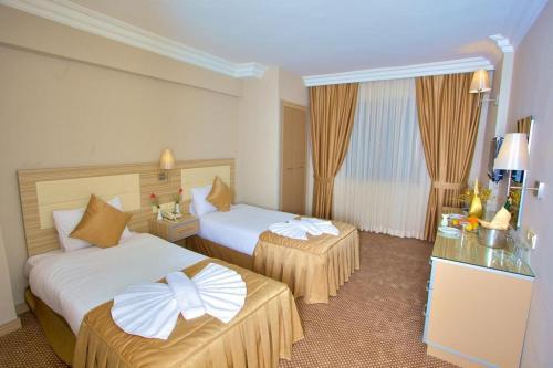Laleli Emin Hotel - Tap to explore photos