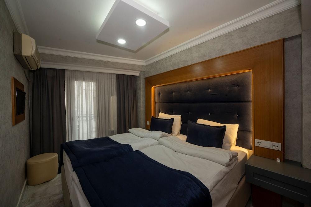 Tamara Residence Room Type - Standard Triple Room Tamara Residence Room Type - Standard Triple Room