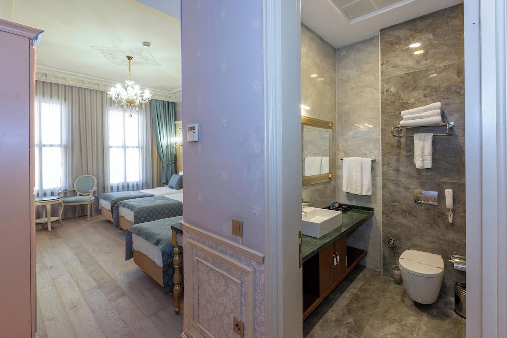 Meserret Palace Hotel Room Type - Deluxe Triple Room Meserret Palace Hotel Room Type - Deluxe Triple Room