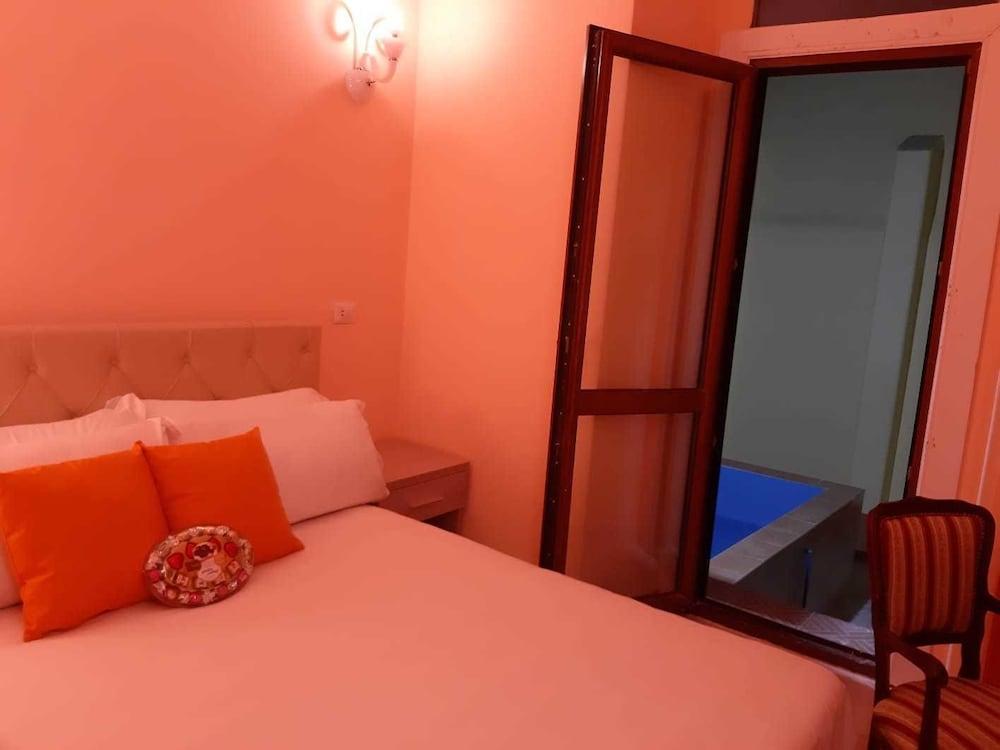 Modina Guest House - Tap to explore photos