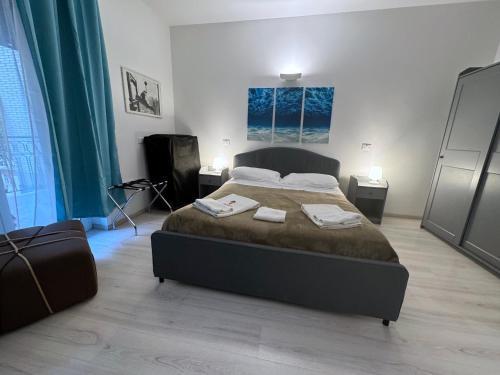 Tiburtina Suites - Tap to explore photos