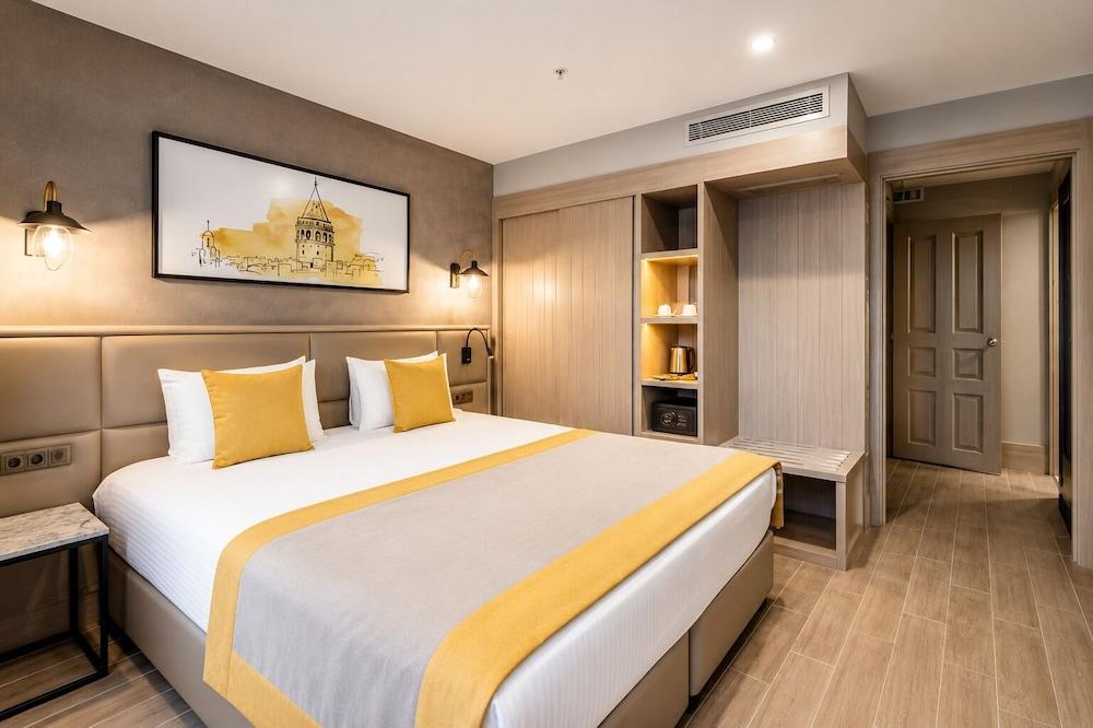 Seraglio Hotel & Suites Room Type - Annex-Economy Family Room Basement Seraglio Hotel & Suites Room Type - Annex-Economy Family Room Basement