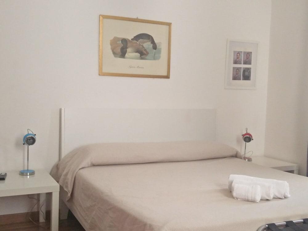 Rome Center Rooms - Tap to explore photos