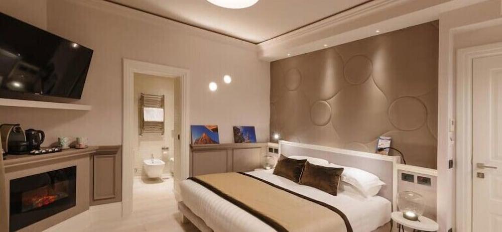 Rhea Silvia Luxury Navona Room Type - Deluxe Triple Room, Fireplace