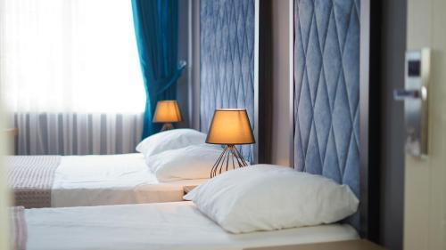 Luka Suit Hotel Room Type - Standard Triple Room