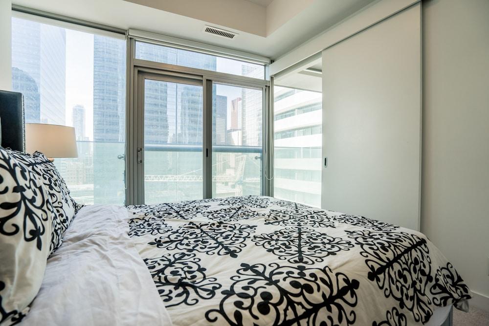Aaira Suites at 65 Bremner Blvd - Tap to explore photos