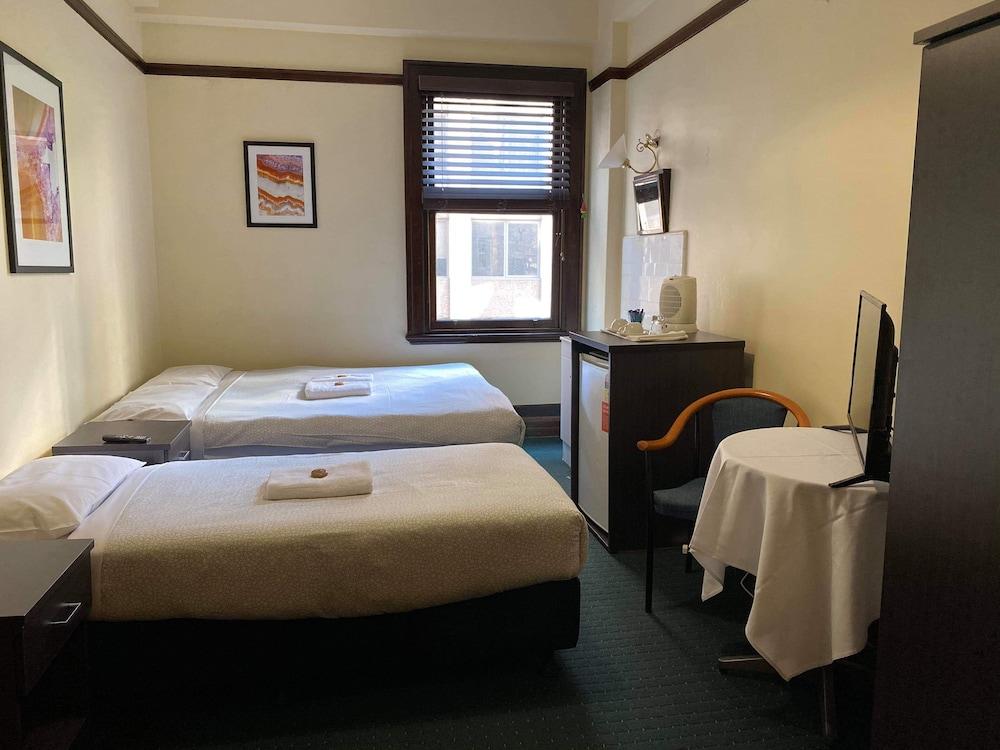 The Occidental Hotel Room Type - Twin Share (1 Queen and 1 Single Bed) with Shared Bathroom