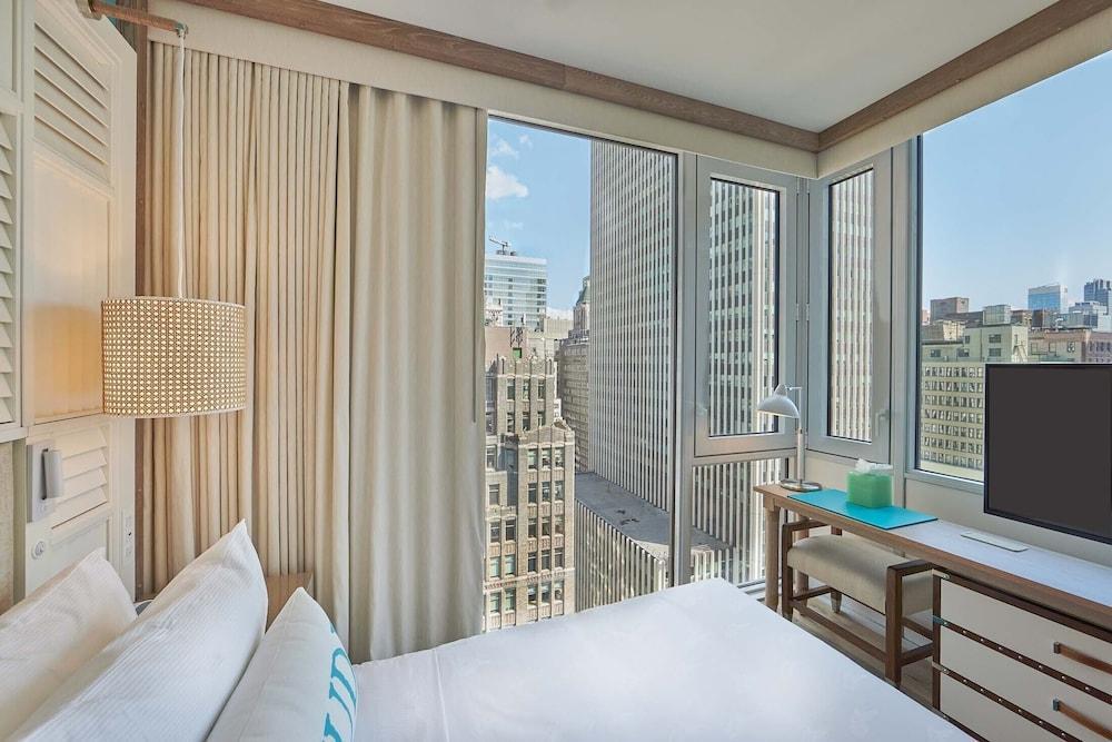 Margaritaville Resort Times Square Room Type - Deluxe Room, 1 Queen Bed (Floors 15th-23rd) Margaritaville Resort Times Square Room Type - Deluxe Room, 1 Queen Bed (Floors 15th-23rd)