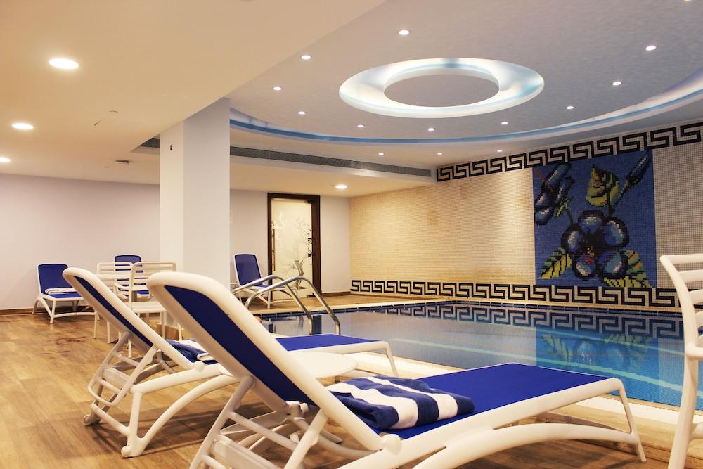 Almansour Suites Hotel Doha - Tap to explore photos