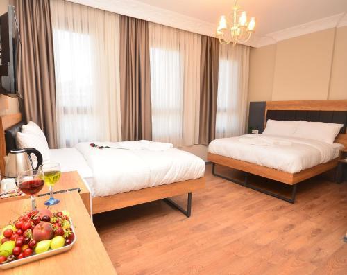 Grand Balyan Hotel & Restaurant Room Type - Quadruple Room with Balcony Grand Balyan Hotel & Restaurant Room Type - Quadruple Room with Balcony
