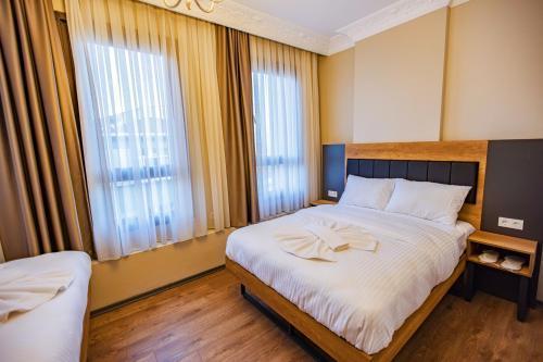 Grand Balyan Hotel & Restaurant Room Type - Classic Quadruple Room
