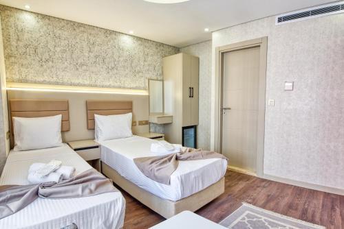 Florina Hotel - Tap to explore photos