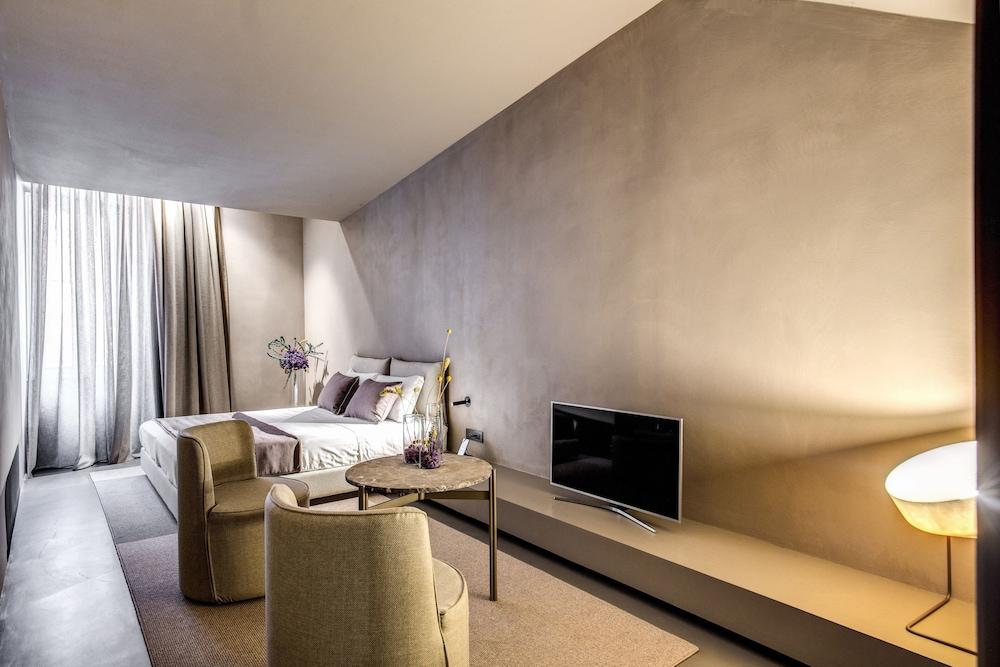 Elysium Suites Collection - Tap to explore photos
