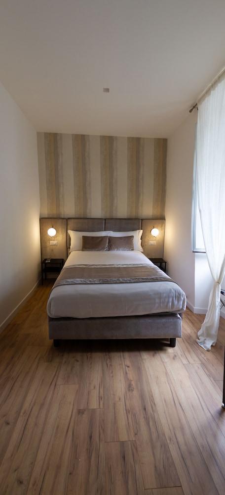 Home at Rome Vatican Suites - Tap to explore photos