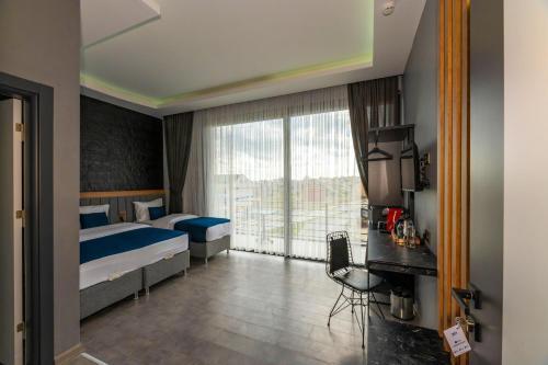 Melanj Airport Hotel Room Type - Deluxe Triple Room Melanj Airport Hotel Room Type - Deluxe Triple Room