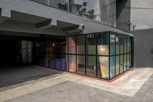 Sans Hotel Roxy Jakarta - Tap to explore photos