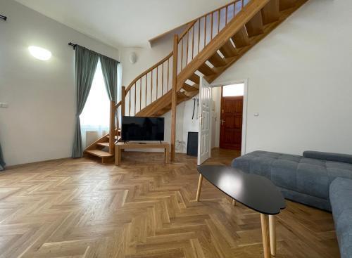 White Swan Boutique Apartments - Tap to explore photos
