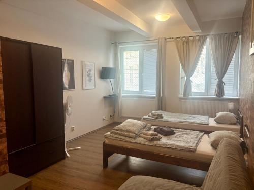 Žižkov Cosy Studio Apartments - Tap to explore photos