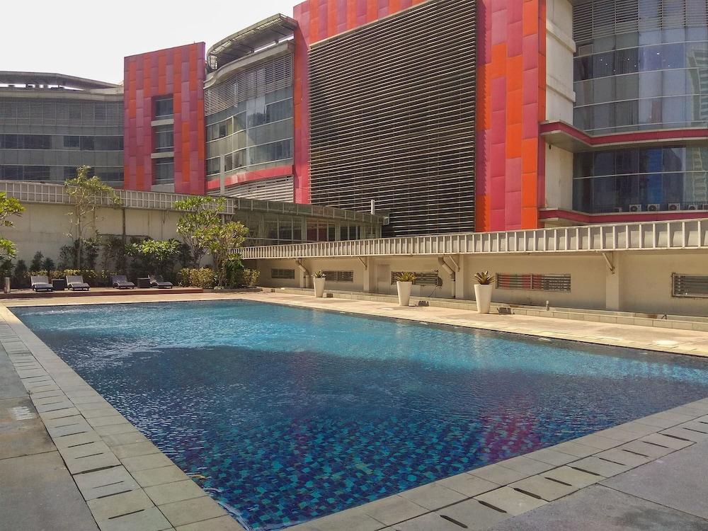 Spacious 2BR @ The Empyreal Condominium Epicentrum Apartment - Tap to explore photos